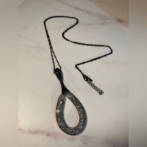 Long statement necklace ‘ Zara’. Executed in hematite. Snake chain.